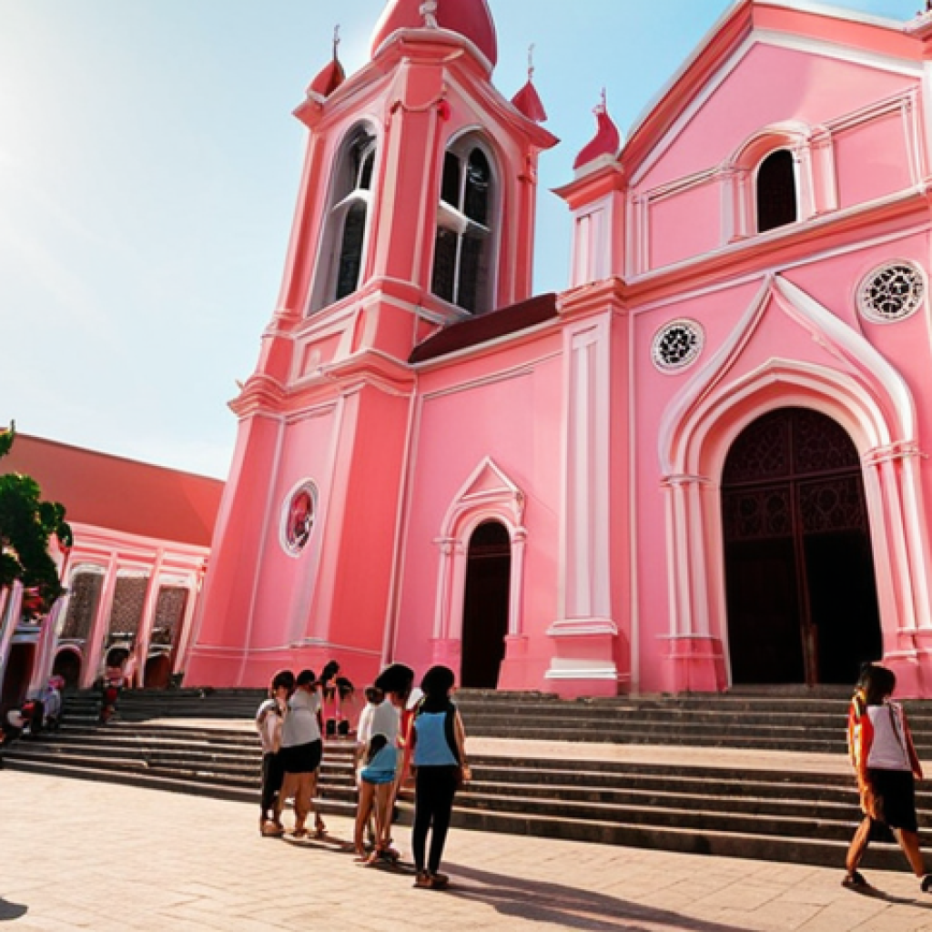 **Prompt:** A wide-angle shot of the Da Nang Cathedral's distinctive pink facade, bathed in the soft glow of the late afternoon sun. Capture the French colonial architecture blended with subtle Vietnamese design elements. In the foreground, local Vietnamese students are gathered, chatting and enjoying the atmosphere, while tourists stroll by, admiring the cathedral.